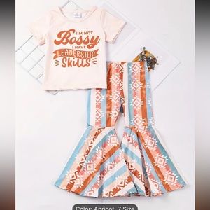 Kids matching outfit. Bellbottom pants and adorable top